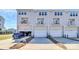 Modern townhome exterior with garages and small balconies at 147 Morning Gap Pkwy, Fort Mill, SC 29715
