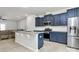 Modern kitchen with stainless steel appliances, stylish countertops, and an eat-in island at 147 Morning Gap Pkwy, Fort Mill, SC 29715