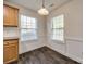 Bright breakfast nook with natural light, wainscoting, and wood-look floors at 1526 Tuckers Glenn Dr, Rock Hill, SC 29732