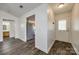 Inviting foyer with wood-look flooring leading into the kitchen and other rooms at 1526 Tuckers Glenn Dr, Rock Hill, SC 29732