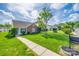 Attractive single-story home with a lush green lawn, sidewalk, and beautiful landscaping at 1526 Tuckers Glenn Dr, Rock Hill, SC 29732