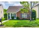 Charming single-story home featuring a well-manicured lawn and inviting curb appeal at 1526 Tuckers Glenn Dr, Rock Hill, SC 29732