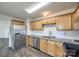 Updated kitchen with stainless steel appliances, granite countertops, and light wood cabinets at 1526 Tuckers Glenn Dr, Rock Hill, SC 29732