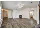 Spacious living room featuring a fireplace, ceiling fan, and wood-look flooring at 1526 Tuckers Glenn Dr, Rock Hill, SC 29732