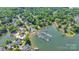 Scenic aerial shot of a lakeside community featuring boat docks and lush green surroundings at 15535 Eagleview Dr, Charlotte, NC 28278