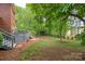 Backyard has trees, patio and space for entertaining at 15535 Eagleview Dr, Charlotte, NC 28278