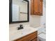 Bathroom featuring modern fixtures, updated vanity, neutral color palette, and shower/tub combo at 15535 Eagleview Dr, Charlotte, NC 28278
