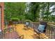 Relaxing deck features outdoor seating and wooded view at 15535 Eagleview Dr, Charlotte, NC 28278