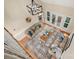 Open living room with high ceilings and abundant natural light leading to outdoor living space at 15535 Eagleview Dr, Charlotte, NC 28278