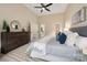 A light-filled bedroom boasts a spacious layout, neutral tones, and backyard views at 15535 Eagleview Dr, Charlotte, NC 28278