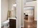 Stylish half-bathroom featuring granite countertop, modern fixtures and a classic design at 166 Wilson Lake Rd, Mooresville, NC 28117