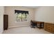 Cozy bedroom featuring a desk and dresser with a window view at 166 Wilson Lake Rd, Mooresville, NC 28117