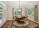 Bright dining room with natural light and elegant rug at 166 Wilson Lake Rd, Mooresville, NC 28117