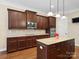 Gourmet kitchen featuring custom cabinets, granite countertops, and stainless steel appliances at 166 Wilson Lake Rd, Mooresville, NC 28117
