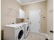 Well-equipped laundry room with modern washer and dryer units at 166 Wilson Lake Rd, Mooresville, NC 28117