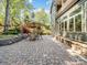 Charming patio with lush landscaping and outdoor seating at 166 Wilson Lake Rd, Mooresville, NC 28117