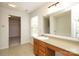 Bright bathroom with window, sink, and walk-in closet at 1965 Leesburg Dr, Clover, SC 29710