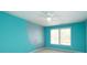 Vibrant bedroom with light and mermaid-themed accent wall at 1965 Leesburg Dr, Clover, SC 29710
