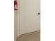Hallway featuring a white door with black knob and tile flooring at 1965 Leesburg Dr, Clover, SC 29710