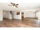 Open-concept living space with staircase access, blending comfort and functionality seamlessly at 1965 Leesburg Dr, Clover, SC 29710