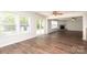 Bright living room with large windows and sliding door, offering a seamless indoor-outdoor flow at 1965 Leesburg Dr, Clover, SC 29710