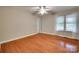 This bedroom boasts hardwood floors and a window providing natural light at 2150 Quiet Creek Pl, Rock Hill, SC 29732