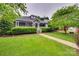 Charming home featuring mature landscaping and a welcoming front porch at 2150 Quiet Creek Pl, Rock Hill, SC 29732