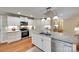 Modern kitchen featuring white cabinets, stainless steel appliances, and granite countertops at 2150 Quiet Creek Pl, Rock Hill, SC 29732