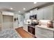 Well-equipped kitchen featuring stainless steel appliances, granite countertops, and ample cabinet space at 2150 Quiet Creek Pl, Rock Hill, SC 29732