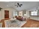 Inviting living room features hardwood floors, a fireplace, and ample natural light at 2150 Quiet Creek Pl, Rock Hill, SC 29732