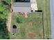 Overhead view of the fenced backyard with patio, shed and fire pit for outdoor enjoyment at 2263 Starbrooke Dr, Newton, NC 28658