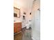 Bathroom with wooden vanity and walk-in shower at 2263 Starbrooke Dr, Newton, NC 28658
