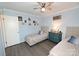 Bedroom featuring neutral color scheme, ceiling fan, and decor at 2263 Starbrooke Dr, Newton, NC 28658