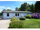 Charming single-story home with a well-maintained lawn and beautiful landscaping at 2263 Starbrooke Dr, Newton, NC 28658