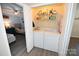 Laundry closet with stacked washer and dryer at 2263 Starbrooke Dr, Newton, NC 28658