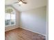 Cozy bedroom featuring a large window providing plenty of natural light at 2416 Hart Rd, Charlotte, NC 28214