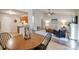 An open view of the dining area flowing into the living room, offering a cohesive and welcoming atmosphere at 2416 Hart Rd, Charlotte, NC 28214