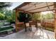 Covered patio with rocking chairs offering a relaxing outdoor living space at 2416 Hart Rd, Charlotte, NC 28214