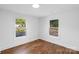 Spacious, sunlit bedroom with wood flooring and ample natural light at 2609 Lowell Rd, Gastonia, NC 28054
