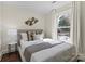 Comfortable bedroom featuring a large window and neutral decor at 2609 Lowell Rd, Gastonia, NC 28054