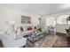 Serene living room offering modern design, hardwood floors, and abundant natural light at 2609 Lowell Rd, Gastonia, NC 28054