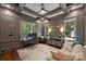 Elegant home office with coffered ceilings, custom shelving, and large windows at 2841 Attaberry Dr, Charlotte, NC 28205