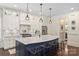 Gourmet kitchen with a large island, stainless steel appliances, and custom cabinetry at 2841 Attaberry Dr, Charlotte, NC 28205