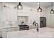 Modern kitchen with marble countertops, stainless steel appliances, and ample storage at 2841 Attaberry Dr, Charlotte, NC 28205
