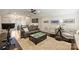 Spacious upstairs living room offering wet bar, dark wood flooring, and ample seating area at 2841 Attaberry Dr, Charlotte, NC 28205