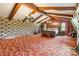 A spacious bedroom with wood beams, hardwood floors, and lots of natural light at 286 Bell Farm Rd, Statesville, NC 28625
