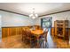 Elegant dining room with hardwood floors, wood trim, and ample space for gatherings at 286 Bell Farm Rd, Statesville, NC 28625