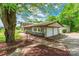 Attached two-car garage with a convenient driveway and well-maintained landscaping at 286 Bell Farm Rd, Statesville, NC 28625