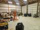 Spacious garage with ample room for parking, storage, and workshop activities featuring high ceilings at 286 Bell Farm Rd, Statesville, NC 28625