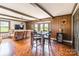 The living room has hardwood floors, natural light, and wood paneling at 286 Bell Farm Rd, Statesville, NC 28625